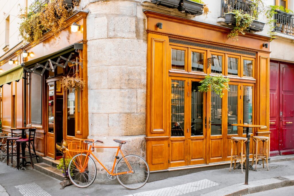a street in paris with a bicycle