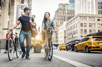 Couple cycling in New York, USA, american bike brands.
