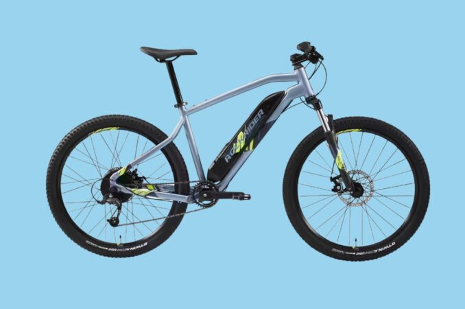 Rockrider E ST100 blue background